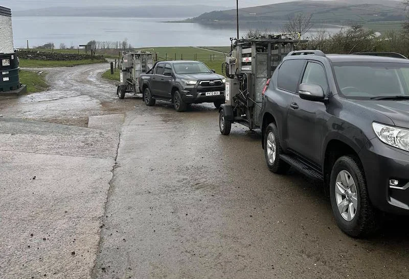Ryan Adamson cattle hoof trimming with work vehicles
